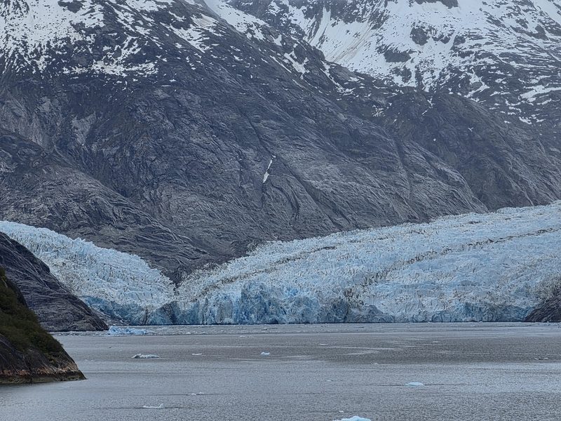 Tidewater glacier meeting the sea in Alaska